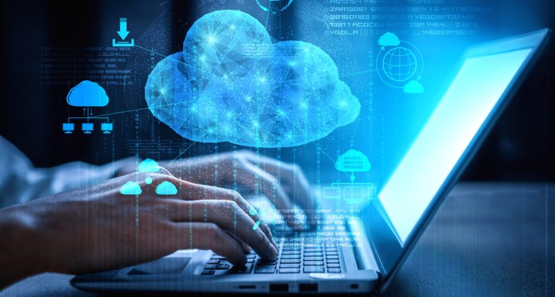 Cloud computing technology and online data storage for business network concept. Computer connects to internet server service for cloud data transfer presented in 3D futuristic graphic interface.